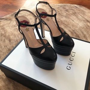GUCCI
Angel black leather platform pumps